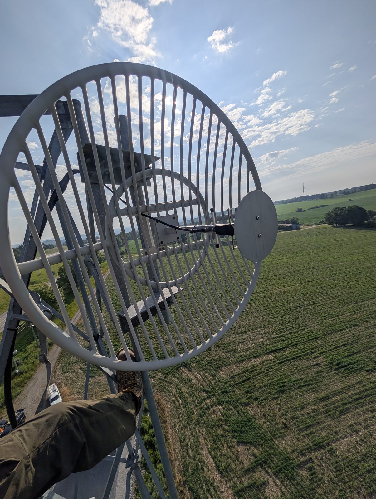Grid microwave antenna aligned over Ontario farmland