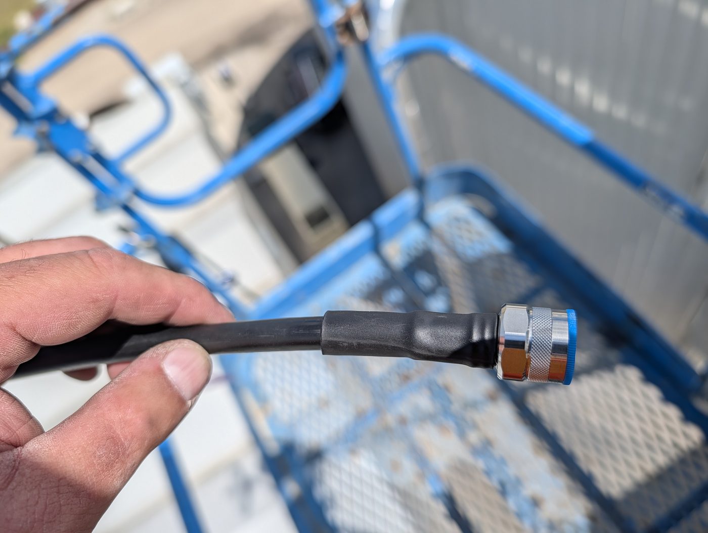 Freshly terminated coax connector during an antenna install